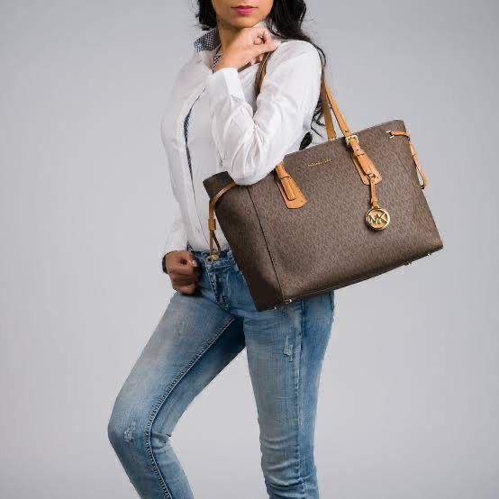 Jet-Set Elegance: Michael Kors Voyager - 10A Quality